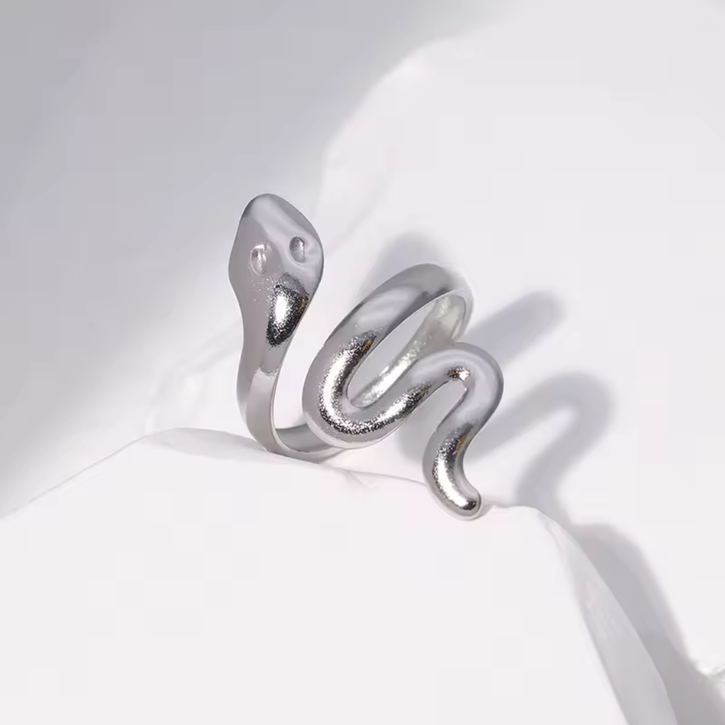 Snake shaped ring,
Opening snake ring,
Adjustable snake ring,
Snake motif ring,
Serpent design ring,
Snake ring with open design,
Unique snake ring,
Modern snake shaped ring,
Stylish snake ring,
Open-ended snake ring,
Snake ring with adjustable fit,
Fashionable snake ring,
Snake wrap ring,
Elegant snake ring,
Statement snake ring