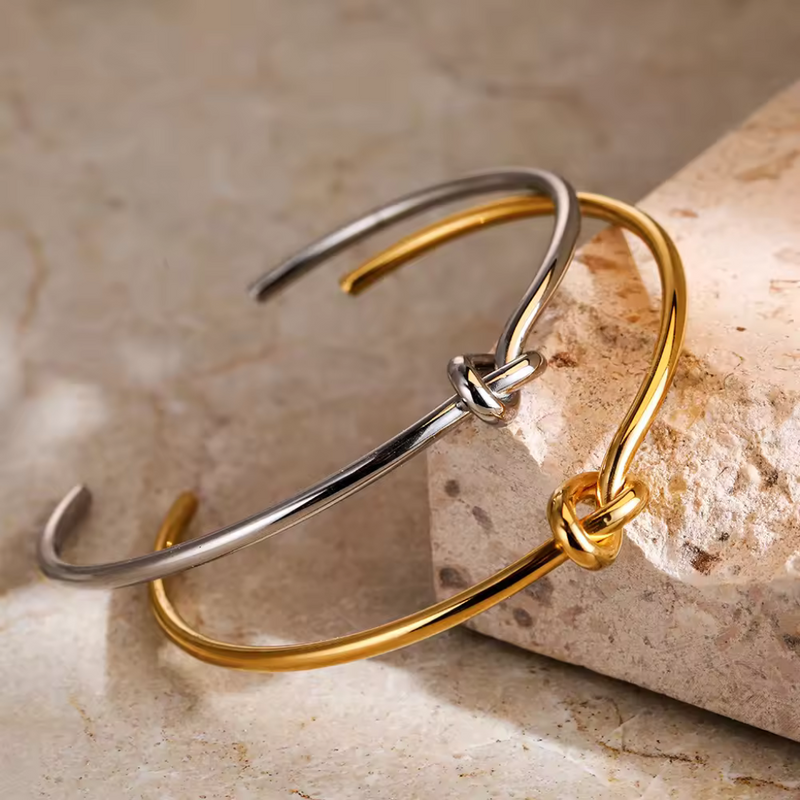 Minimalist gold knot cuff bracelet with polished finish